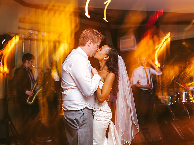 59-Bride-and-Groom-kissing-on-dance-floor-during-wedding-by-Toronto-photographer.jpg